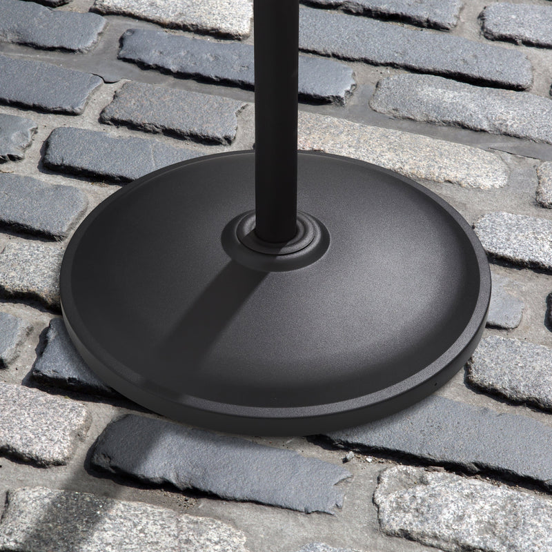 Shot of the Swan Stand Patio Heater's base on a cobbled stone patio