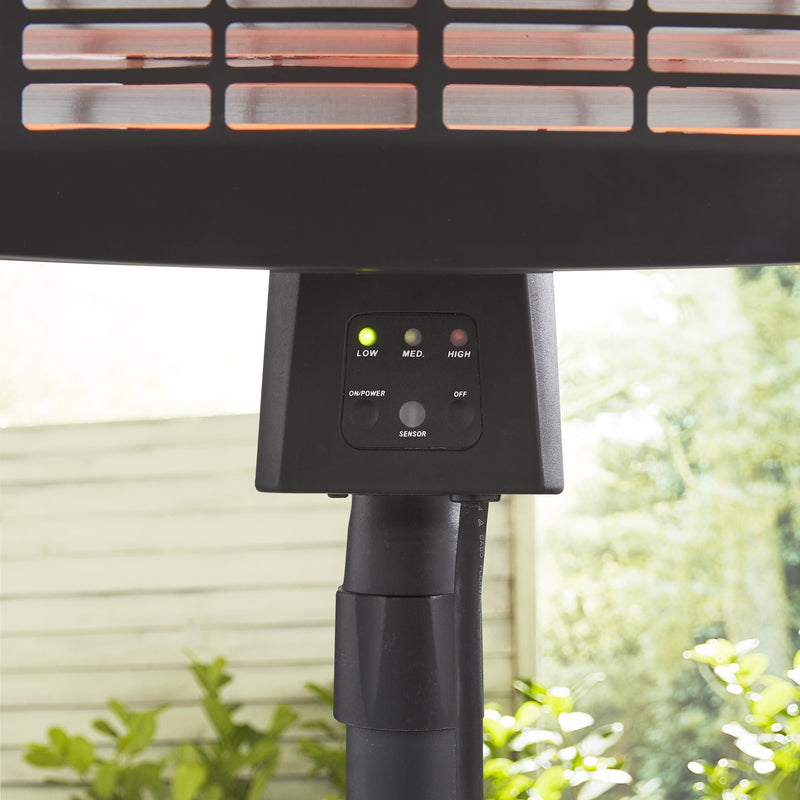 Close up shot of the Swan Stand Patio Heater's control light dashboard in somebody's patio