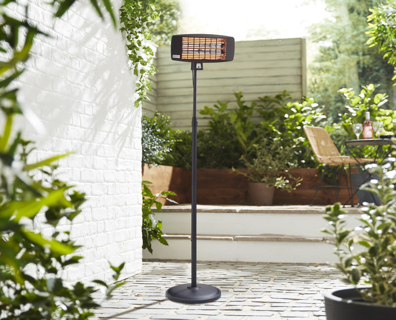 Swan Stand Patio Heater in stone and garden patio