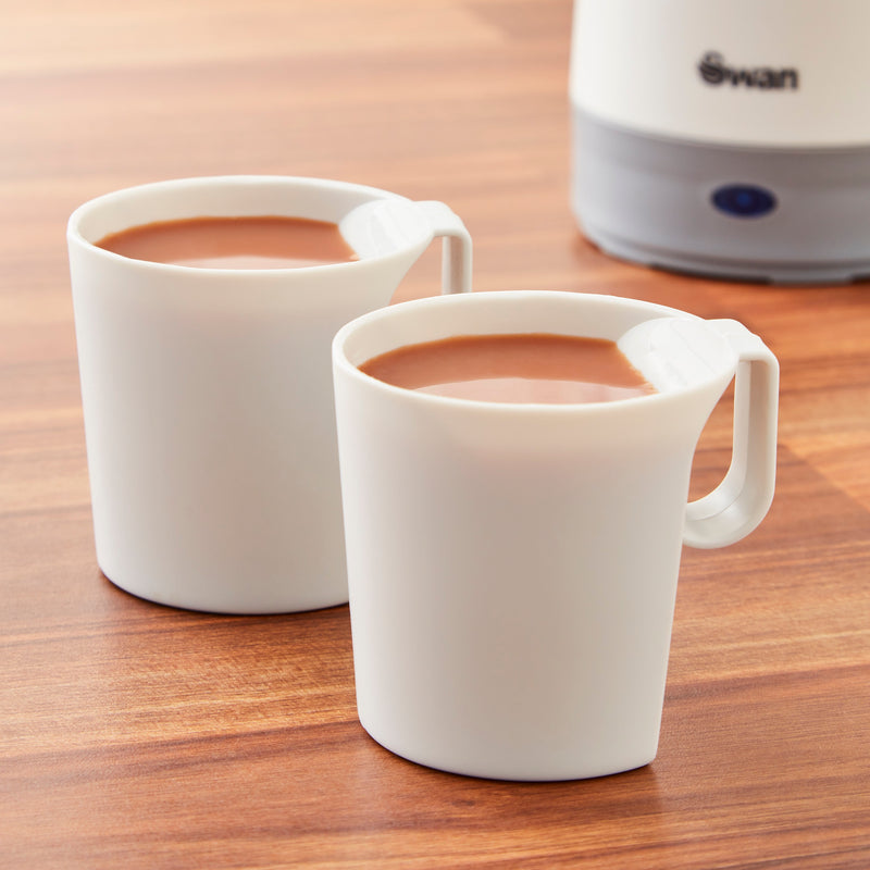 Close-up of two small mugs that come along with the Swan Travel Kettle